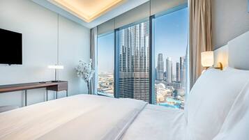 2 habitaciones, caja de seguridad en la habitación y escritorio