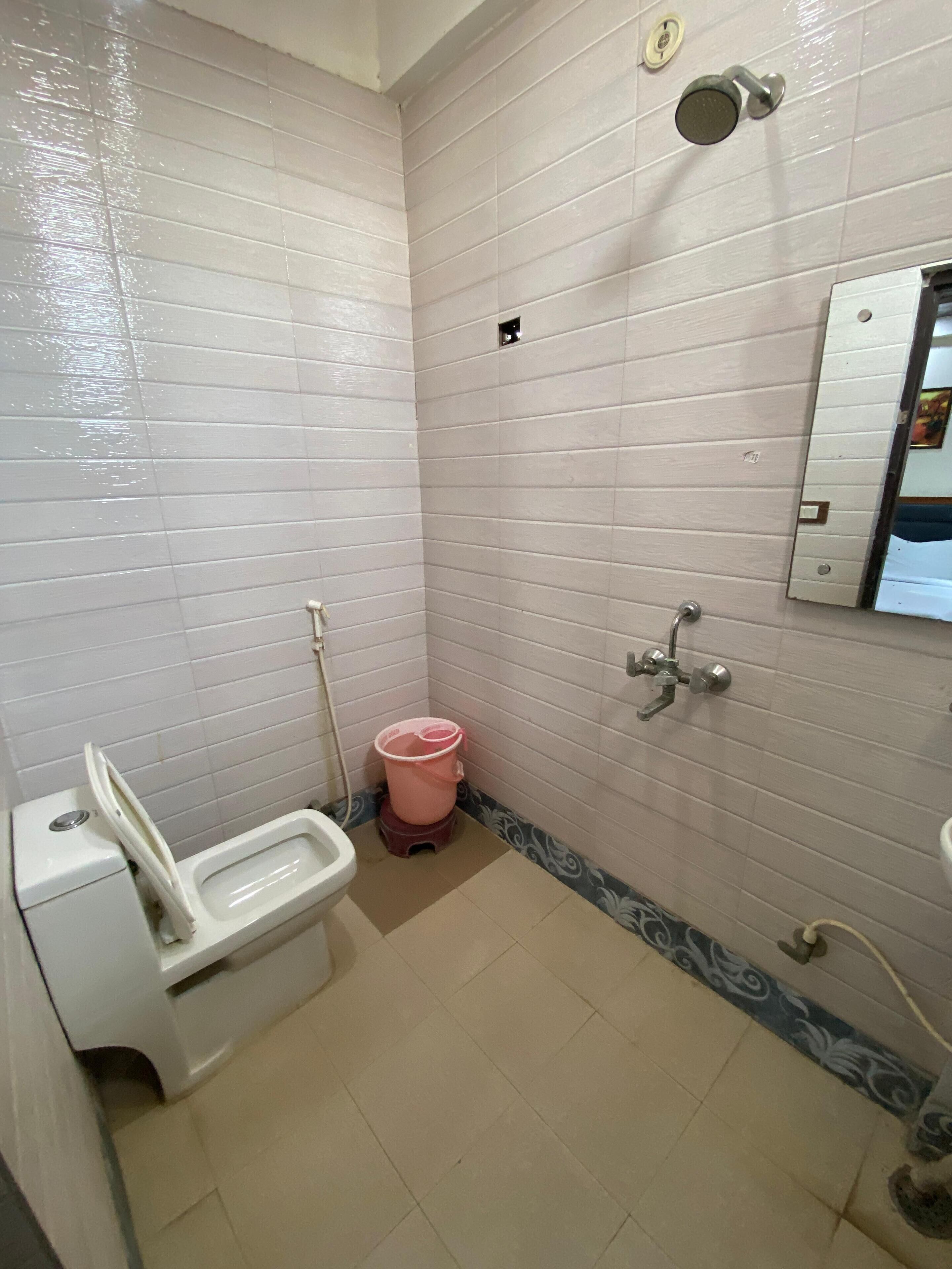 Shower, towels, soap, shampoo