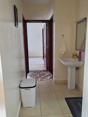 Shower, towels, soap, toilet paper