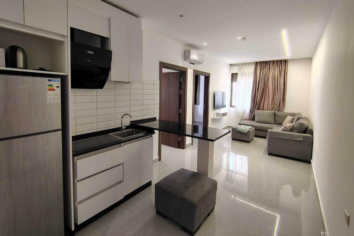 Apartamento Deluxe, vistas a la ciudad | Zona de estar