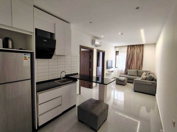 Deluxe Apartment, City View | Living area - Masaken Hotel Apartments (Amman)