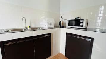 Fridge, microwave, cookware/dishes/utensils