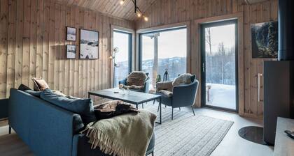 Acogedora cabaña familiar – Centro de esquí, servicio de transporte en autobús