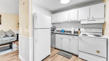 Fridge, microwave, stovetop, coffee/tea maker