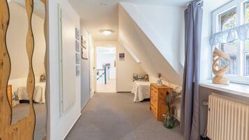 2 bedrooms, desk, iron/ironing board, travel crib