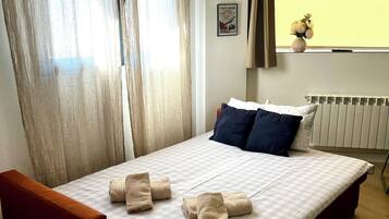 1 chambre, fer et planche Ă repasser, Wi-Fi, draps fournis