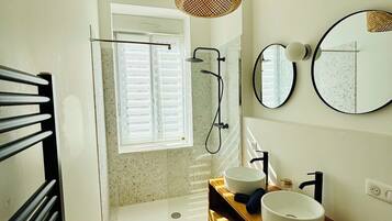 Shower, hair dryer, towels, soap