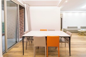 Apartment, 4 Bedrooms, City View | Living room | Smart TV