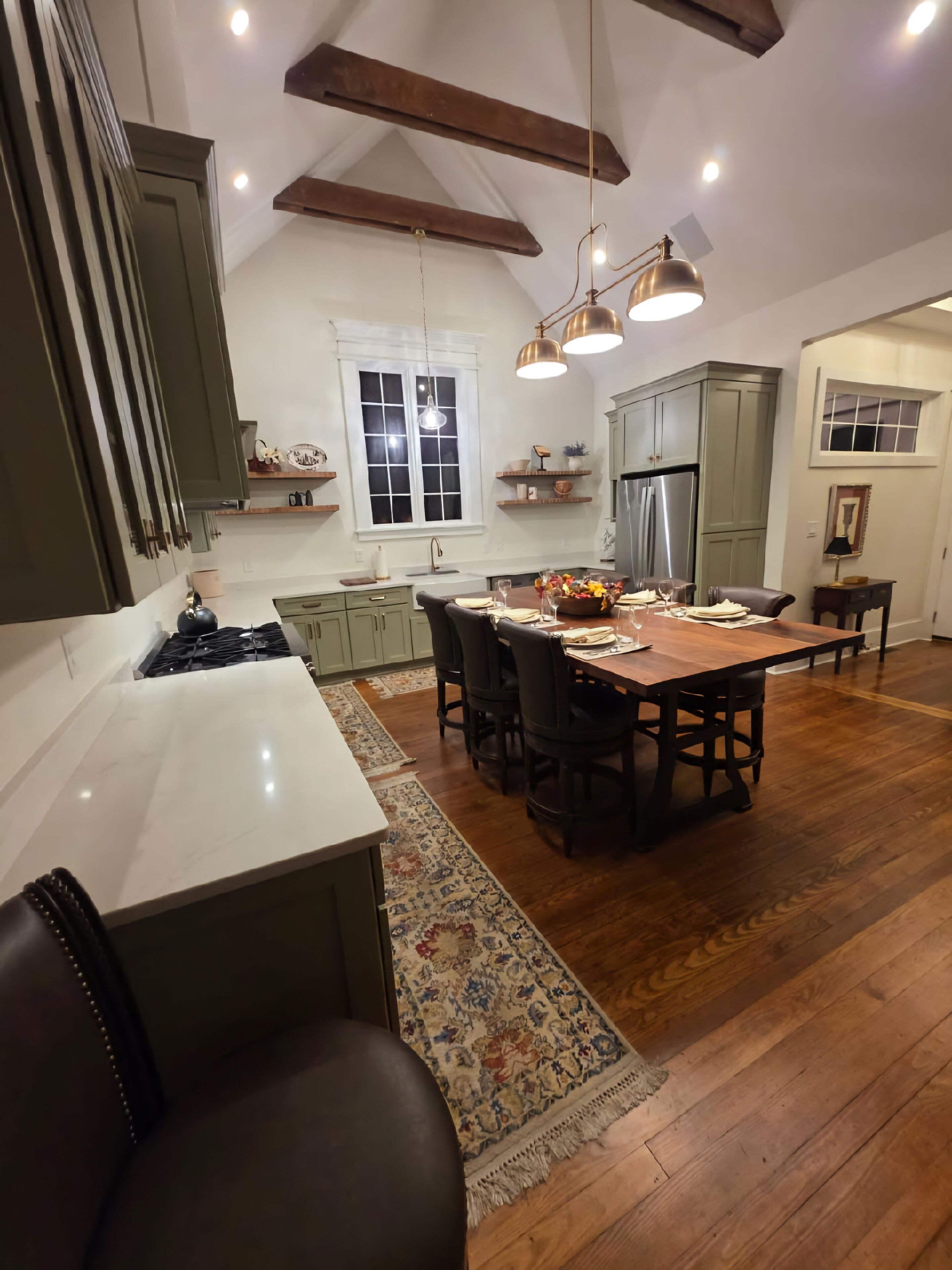 Fully equipped Kitchen with Seating for 8 at the hand-made 4'x8' Walnut Table.