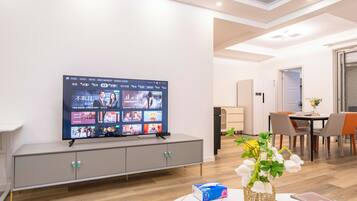 Superior Apartment, 4 Bedrooms, City View | Living room | Smart TV