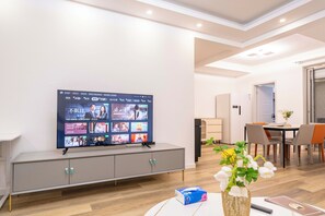 Superior Apartment, 4 Bedrooms, City View | Living room | Smart TV
