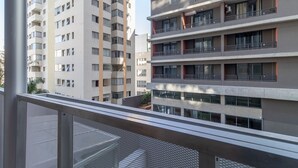 A multi-story residential building with balconies and large windows. - Frei215 in S o Paulo (São Paulo)