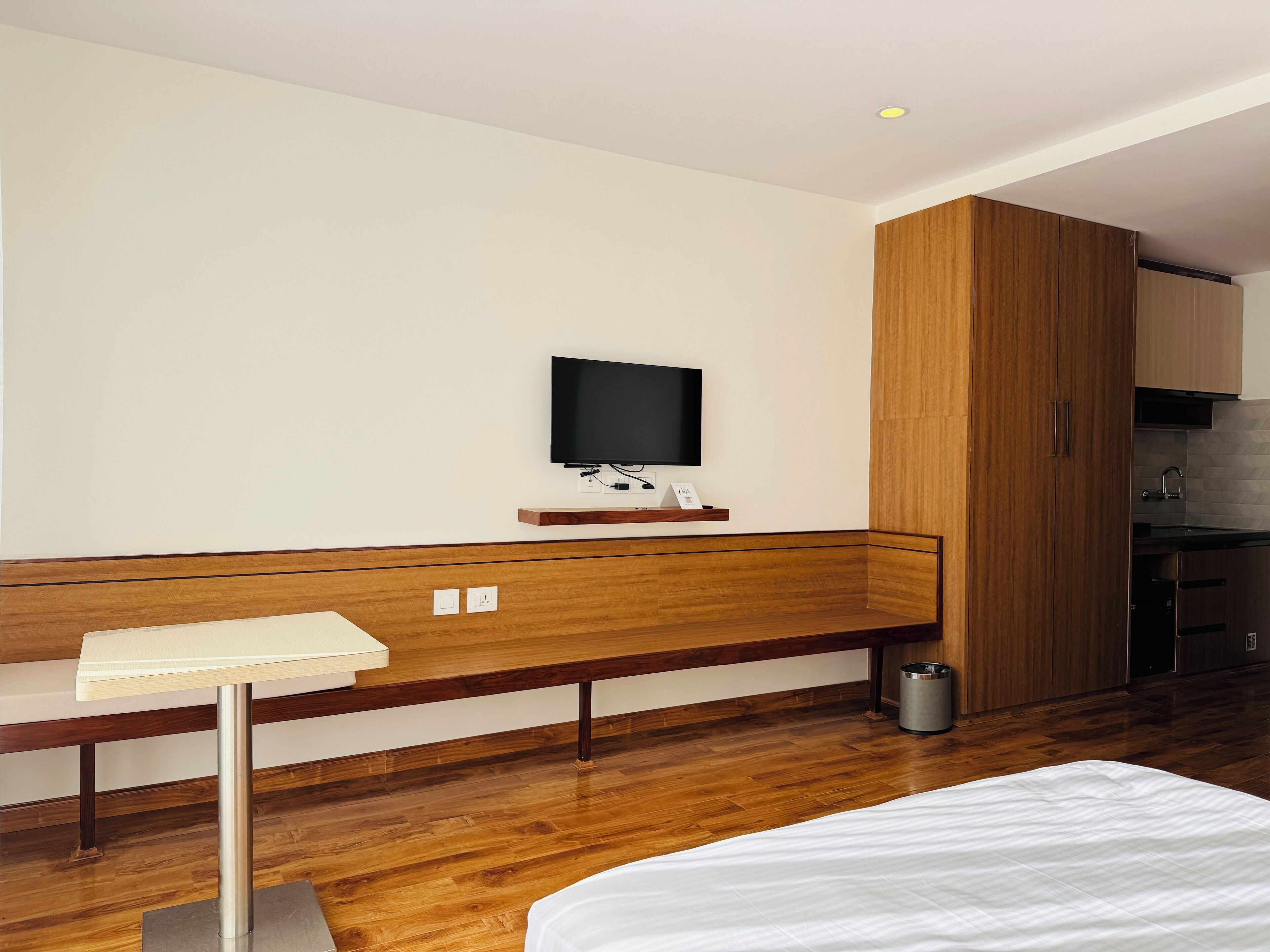 Premium bedding, in-room safe, laptop workspace, soundproofing