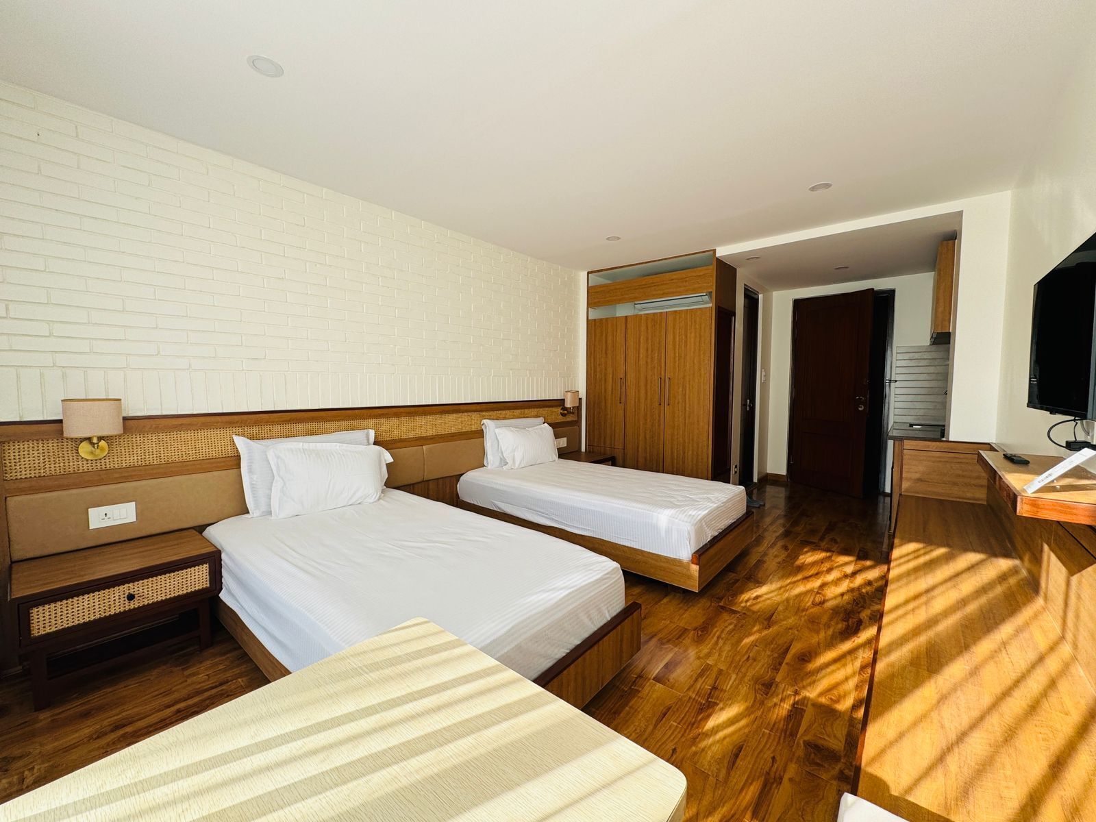 Premium bedding, in-room safe, laptop workspace, soundproofing