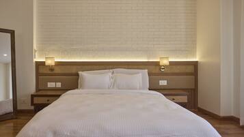 Premium bedding, in-room safe, laptop workspace, soundproofing