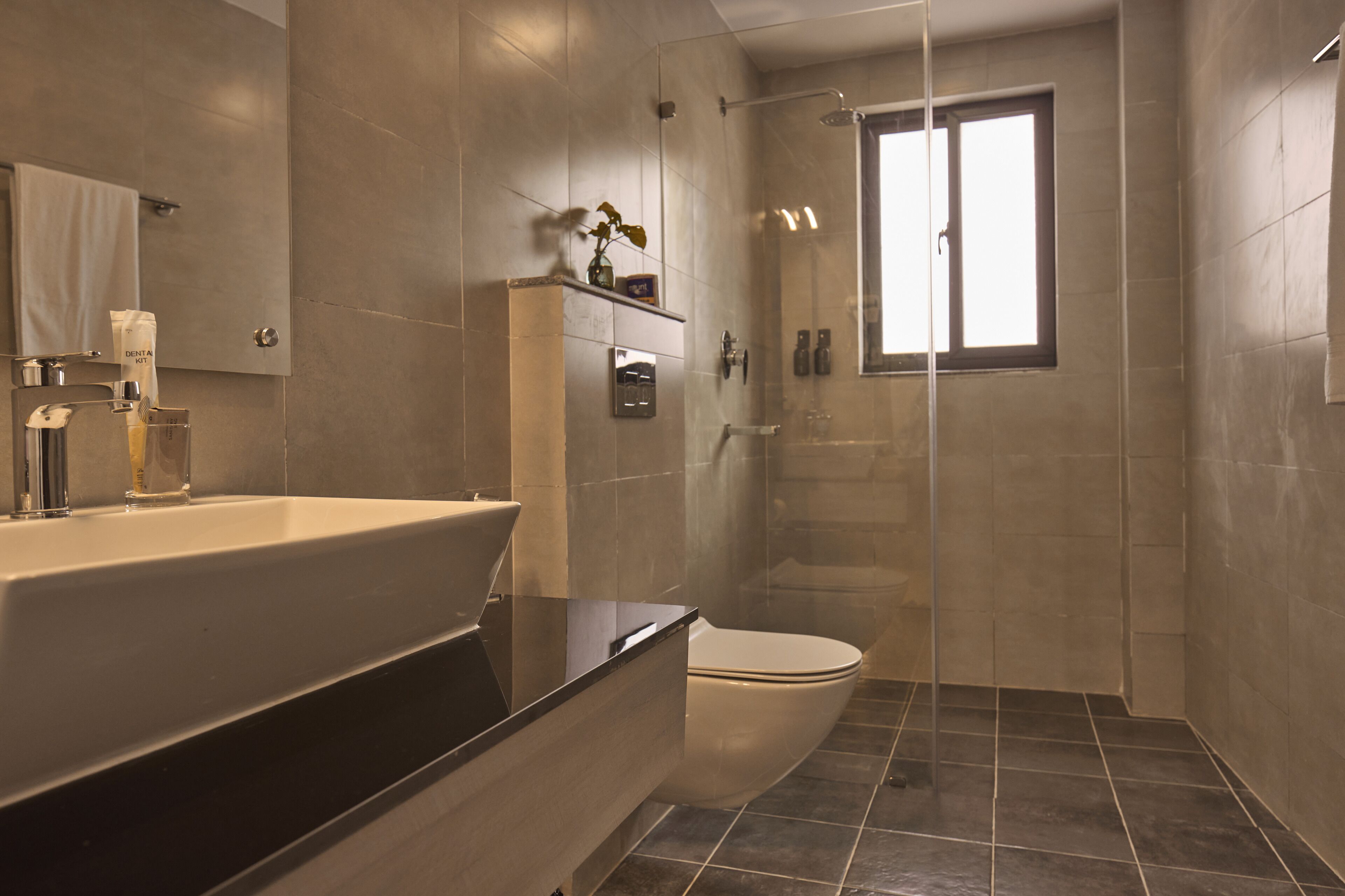 Shower, free toiletries, hair dryer, slippers