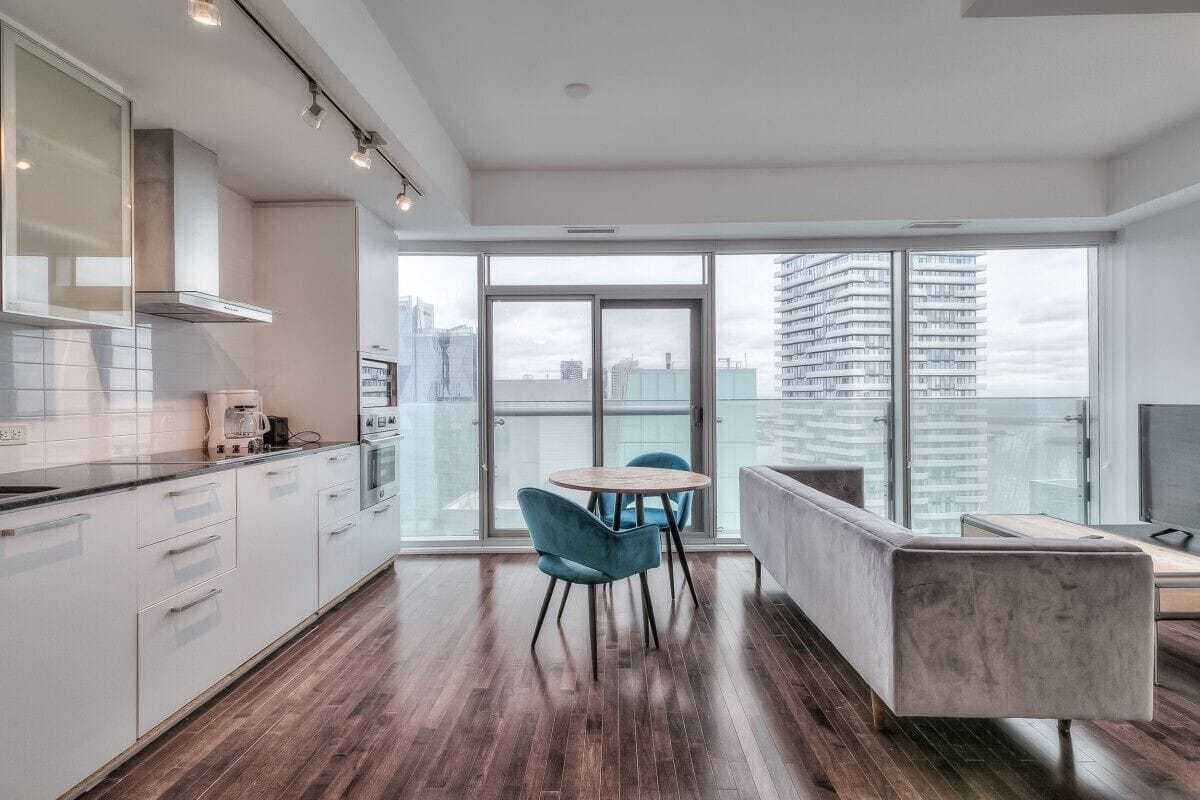 Business Suite, Non Smoking, Lake View | Living area | 44-inch TV with digital channels