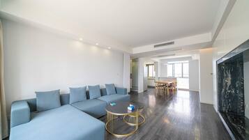 Superior Apartment, 3 Bedrooms, City View | Living room | Smart TV
