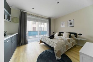 1 dormitori, planxa i posts de planxar, wifi gratuïta i roba de llit 