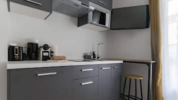 Fridge, microwave, stovetop, coffee/tea maker