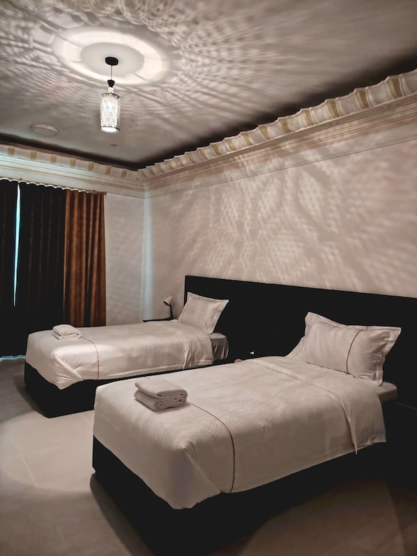 Chambre Double ou avec lits jumeaux | Fer et planche à repasser, Wi-Fi gratuit