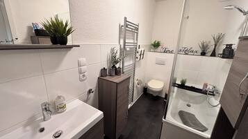 Hair dryer, towels, soap, toilet paper
