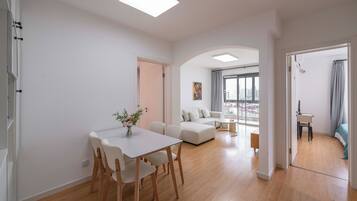 Superior Apartment, 2 Bedrooms, City View | Living room | Smart TV