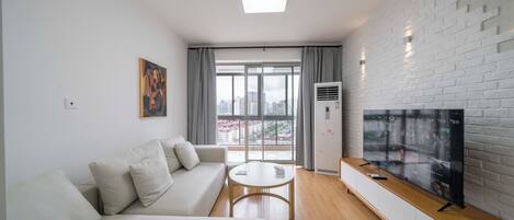 Superior Apartment, 2 Bedrooms, City View | Living room | Smart TV