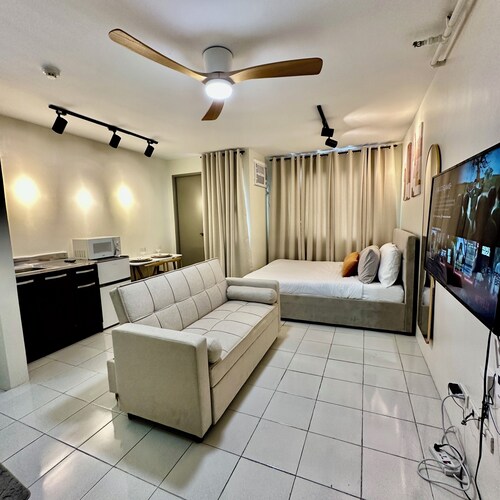 Comfy condo  beside Enchanted Kingdom