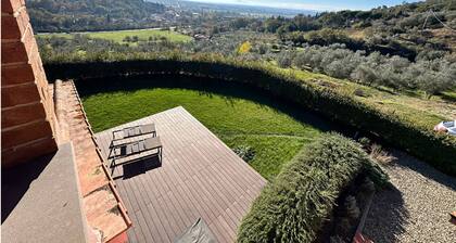 An oasis of peace and warmth of home, amidst thoughtful design and views toward the hills.