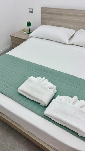 2 habitaciones, tabla de planchar con plancha y wifi gratis 