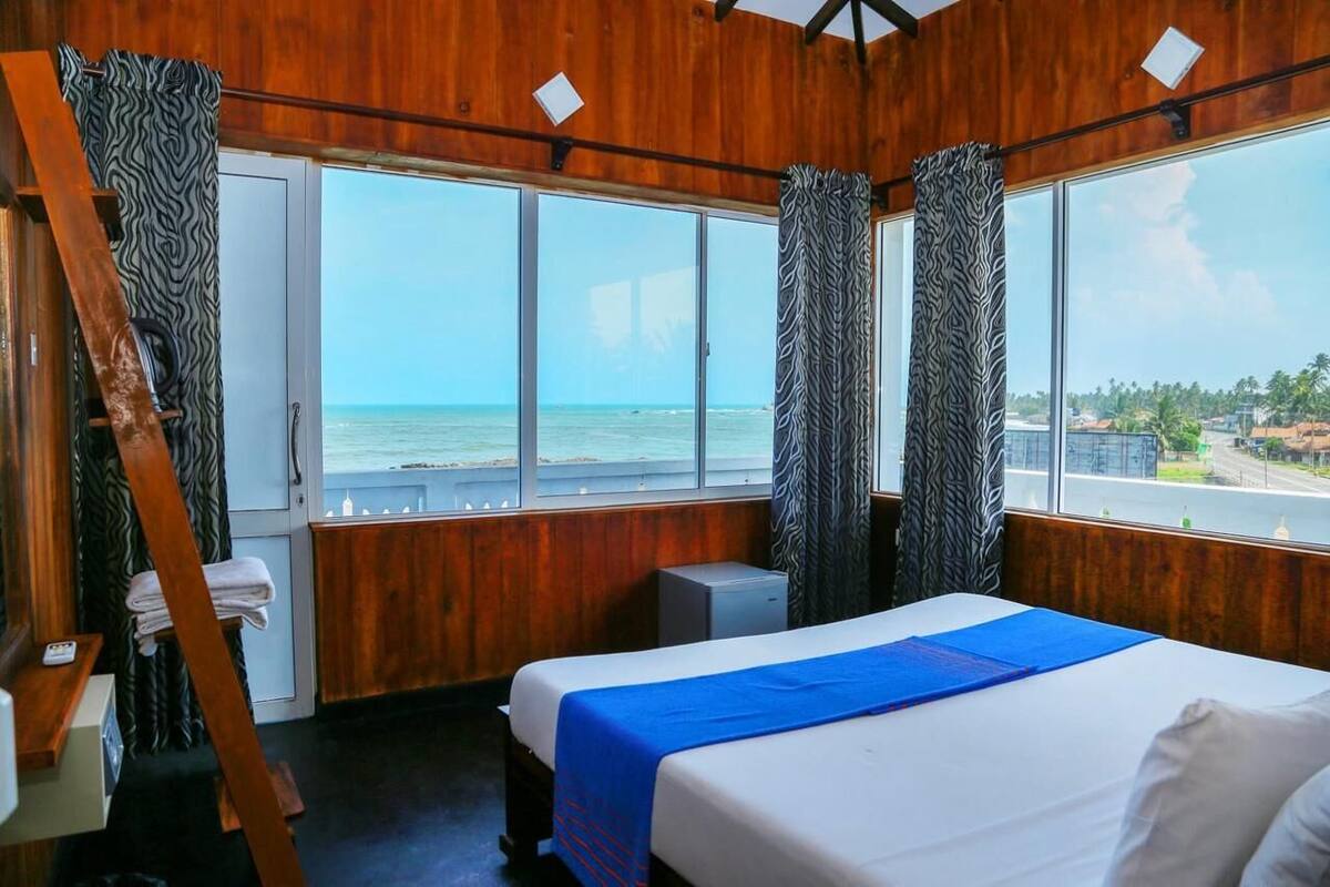 Standard Triple Room, Balcony, City View | Desk, iron/ironing board, free WiFi