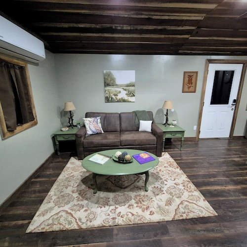 Owl's Nest, a rustic tiny house located 3.5 miles off I-65 in Evergreen, Alabama