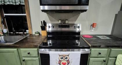 Owl's Nest, a rustic tiny house located 3.5 miles off I-65 in Evergreen, Alabama