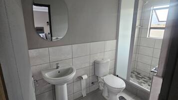 Deluxe Double Room, Patio | Bathroom | Soap, shampoo, toilet paper