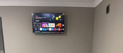 Deluxe Double Room, Patio | Living area