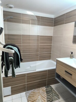 Hair dryer, towels, soap, toilet paper