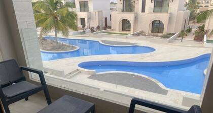 Swimming pool view apartment in Salalah