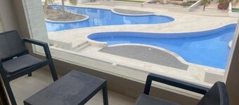 Swimming pool view apartment in Salalah