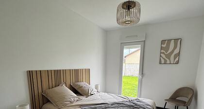 Modern house anould near ski slope with garden