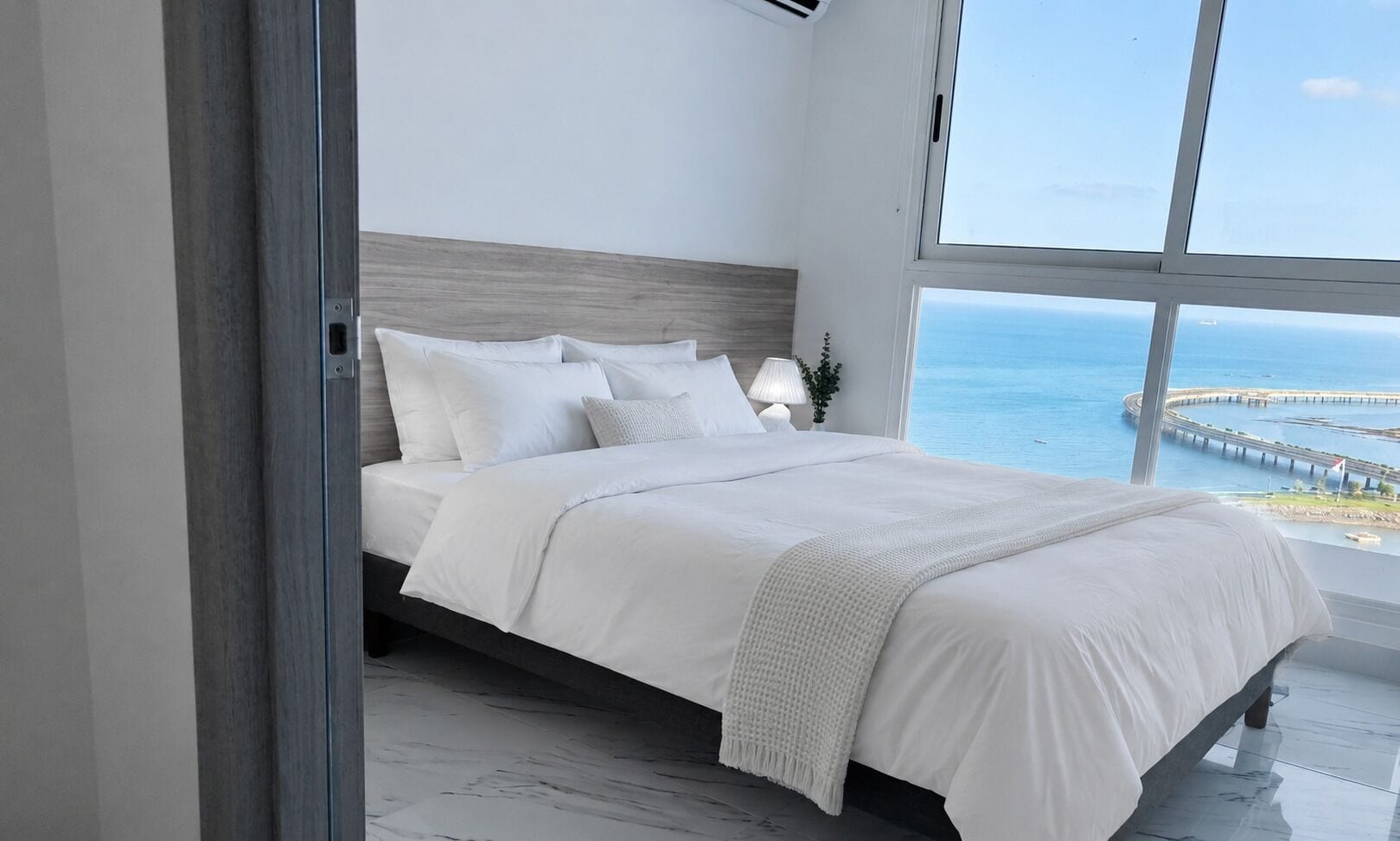 Executive Apartment, Ocean View | Minibar, individually decorated, individually furnished, desk