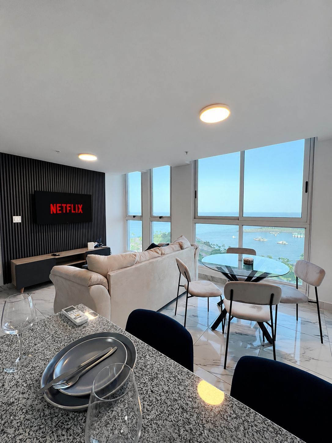 Panoramic Apartment, Ocean View | Minibar, individually decorated, individually furnished