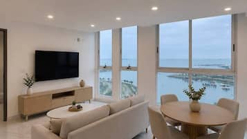 Panoramic Apartment, Ocean View | Minibar, individually decorated, individually furnished, desk