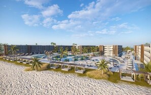 A resort with multiple swimming pools, beachside cabanas, and palm trees. - PORTO 2 LIFE RESORT - MARÉ ALTA (Ipojuca)