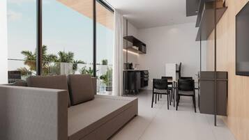 Quarto casal superluxo, sacada, vista parcial para o mar | Área de estar