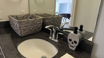 Hair dryer, towels, soap, toilet paper