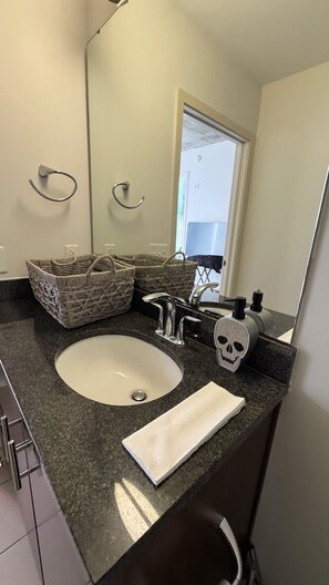 Hair dryer, towels, soap, toilet paper