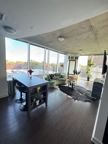 2-bedroom  High Rise condo in the heart of Downtown Raleigh with free parking!