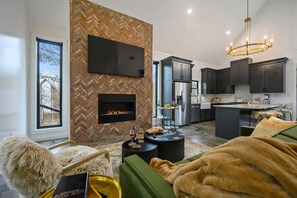 Smart TV, fireplace, books, music library