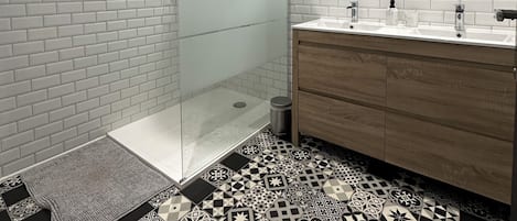 Shower, hair dryer, towels, soap